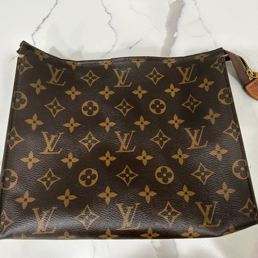 Used toiletry Louie vitton bag